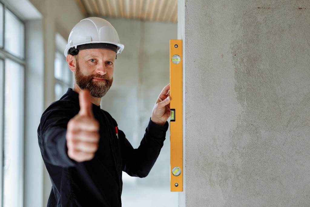A builder reviewing a project with a homeowner